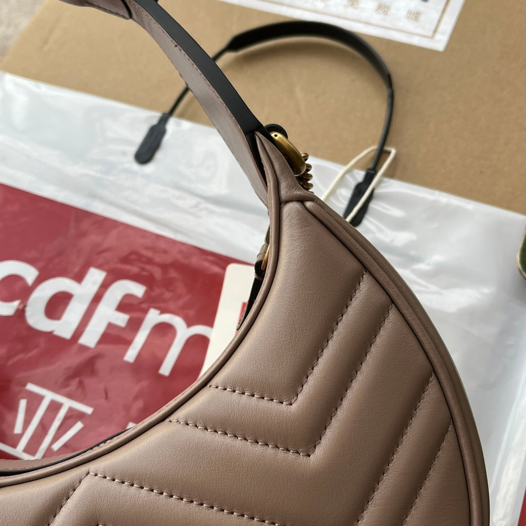 G-ucci Marmont half-moon-shaped mini bag