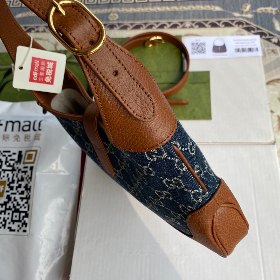 G-ucci Halbmondförmige GG Mini-Tasche