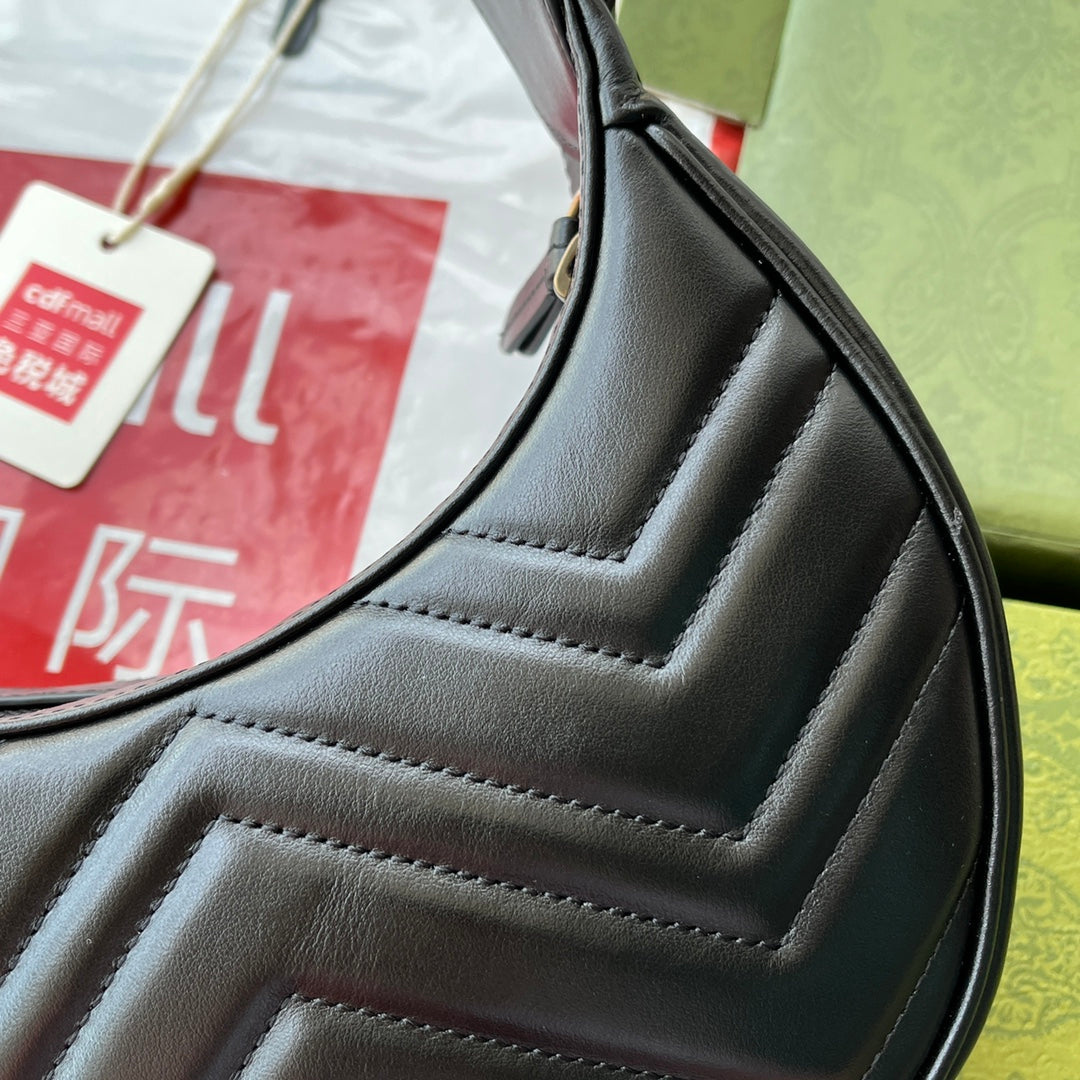G-ucci Marmont half-moon-shaped mini bag